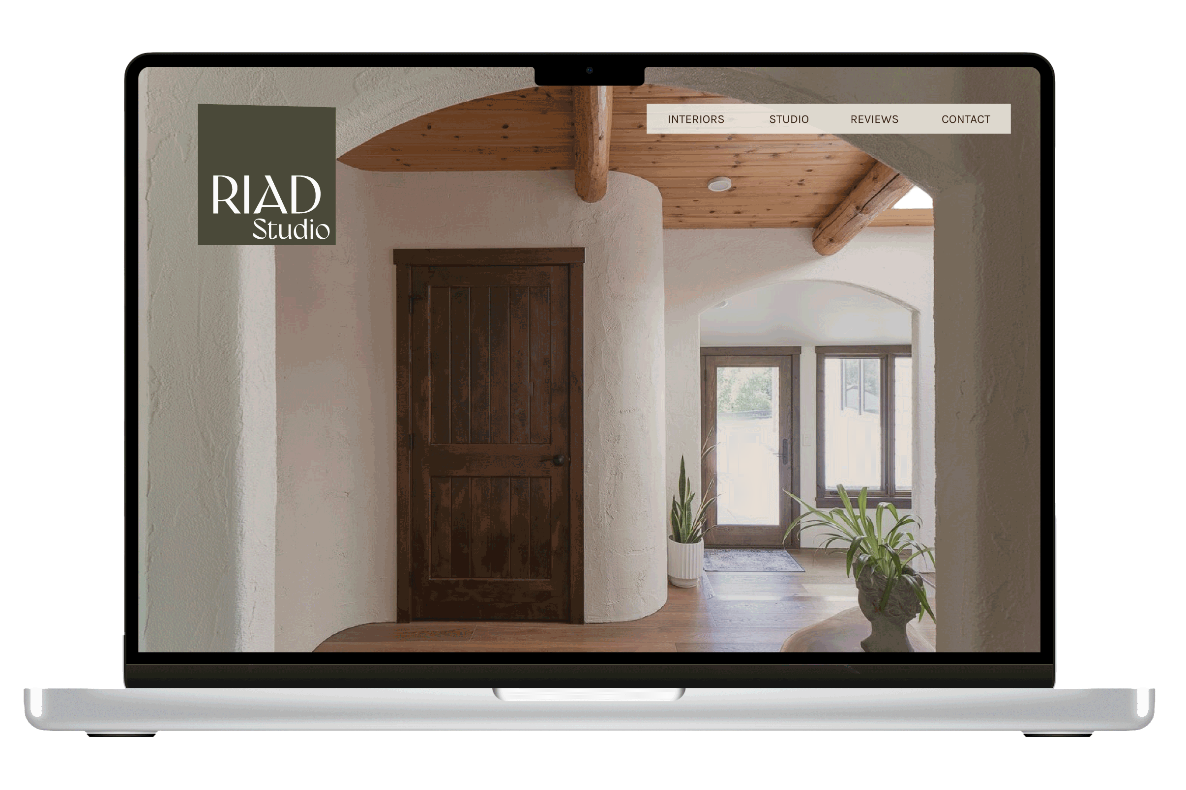 Homepage of RIAD Studio website on a laptop