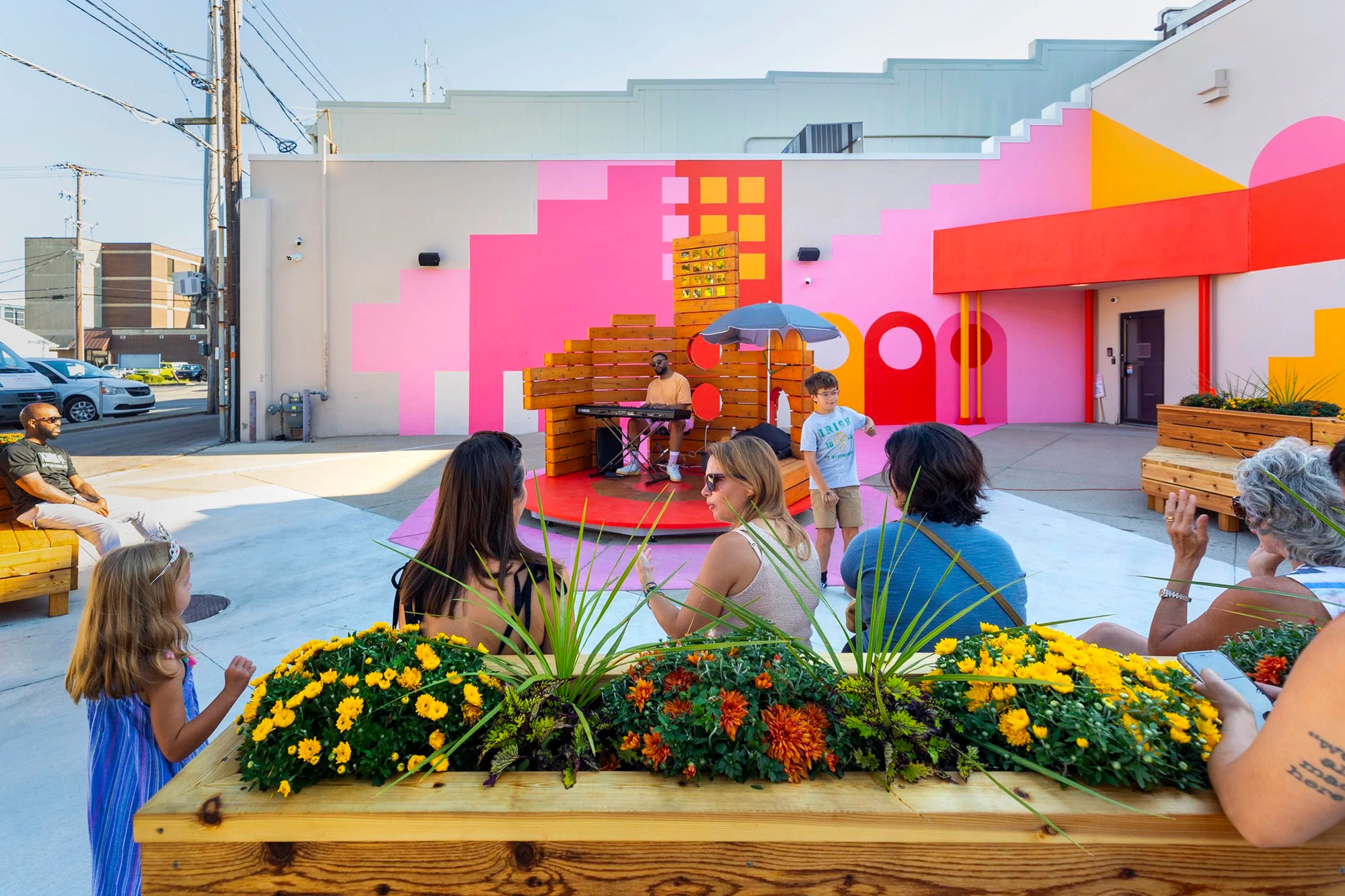 People sitting at installation at Exhibit Columbus