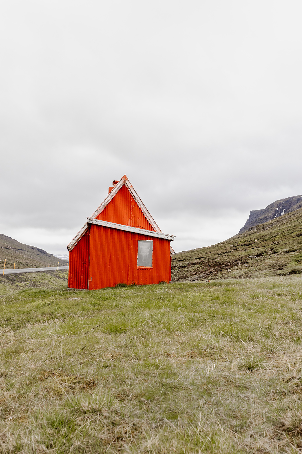 orange building on a ridge line
